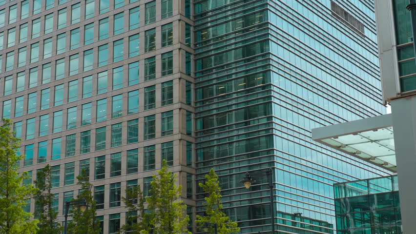 Modern Architecture Office Buildings modern architecture glass office building. shot in raw 4k ultrahd Modern Architecture Office Buildings modern architecture glass office building. shot in raw 4k ultrahd