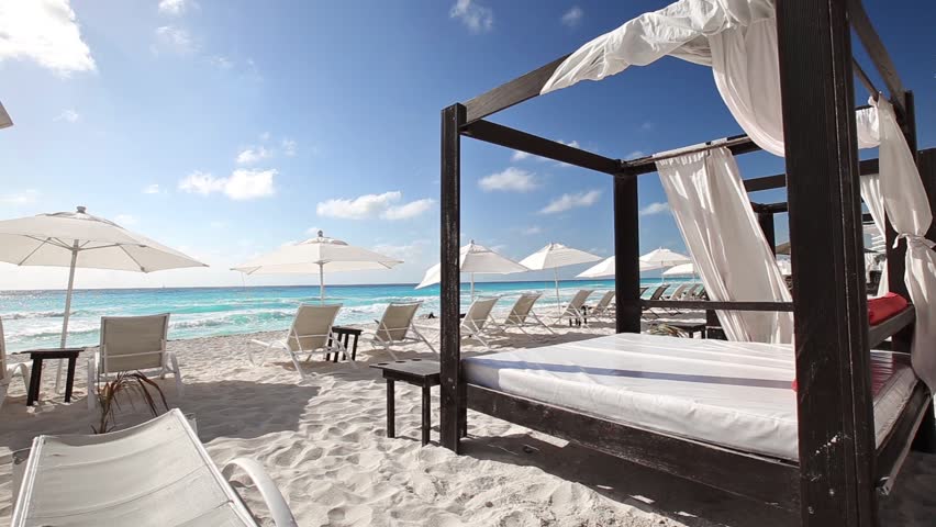 Luxury Wooden Lounge Bed On A Beautiful Caribbean Beach Stock Footage