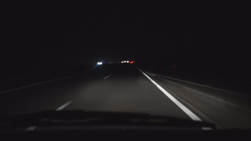 Driving Down A Twisting And Turning Dark Rural Highway At Night ...