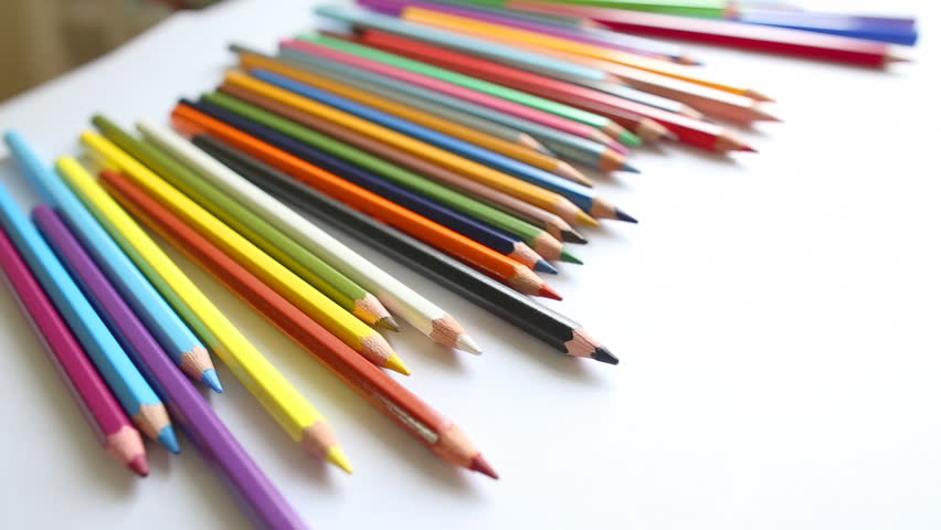 Stock video of close-up colored pencils, paper and watercolor ...