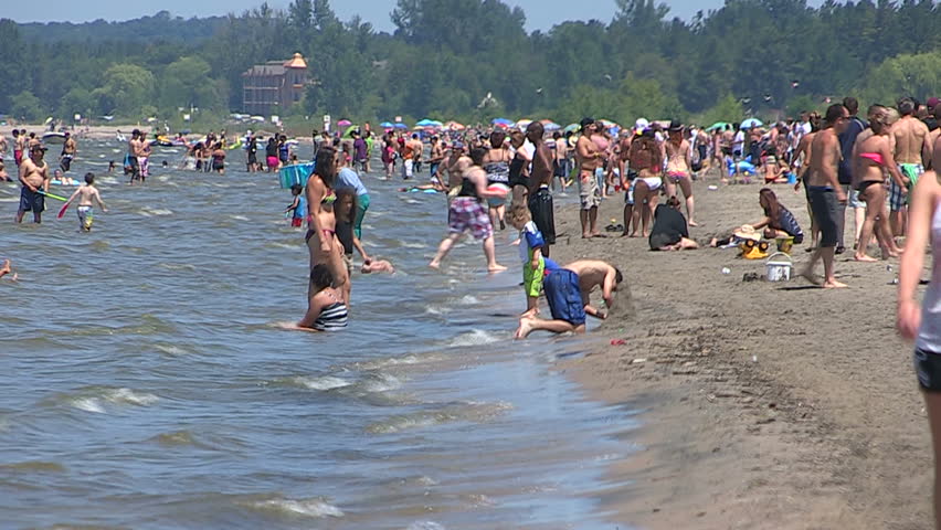 Wasaga Beach Ontario Canada July Stock Footage Video 100 Royalty Wasaga Beach Ontario Canada July 2017 Scorching Hot Summer Scenes On Sand And Water At
