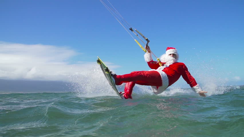 Slow Motion Extreme Santa Claus Kite Surfing In Ocean Stock Footage 