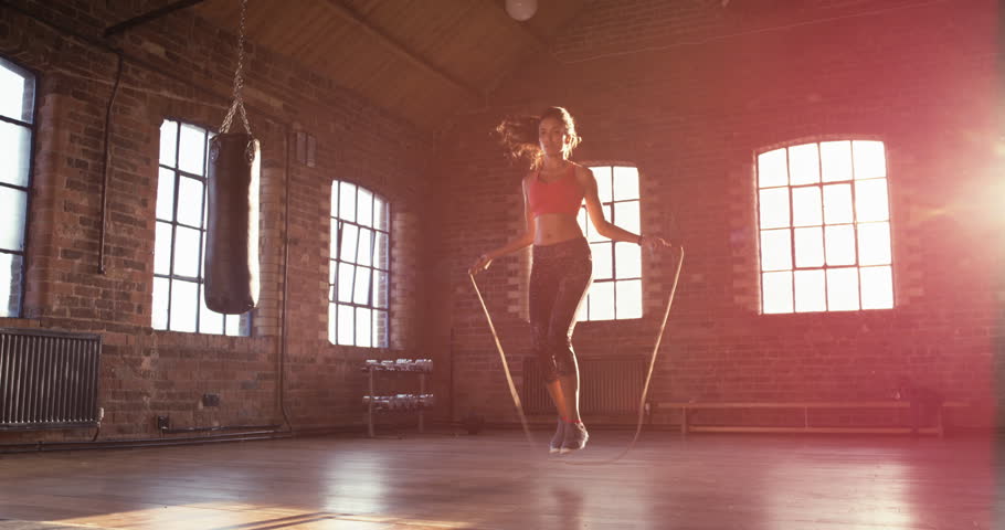 Mixed race Skipping woman training at the gym working out is healthy fitness body kickboxer series