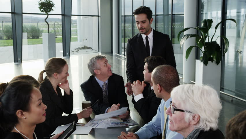 Image result for hd images of a black man in a meeting white men