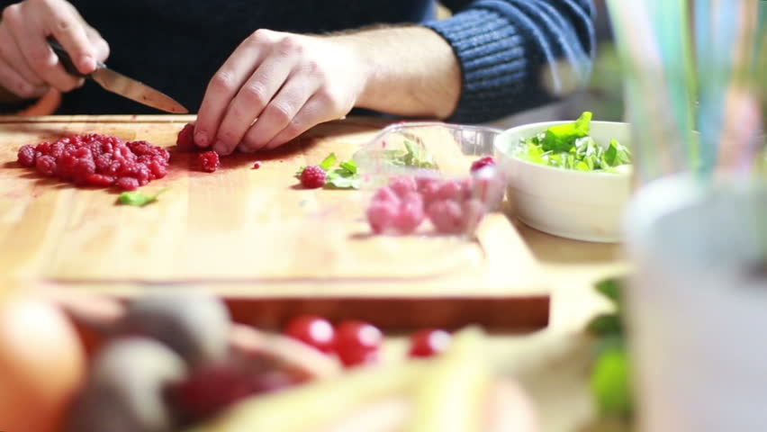 Restaurant Kitchen Hand close-up of chef hands cooking and preparing asian food and sushi Restaurant Kitchen Hand close-up of chef hands cooking and preparing asian food and sushi