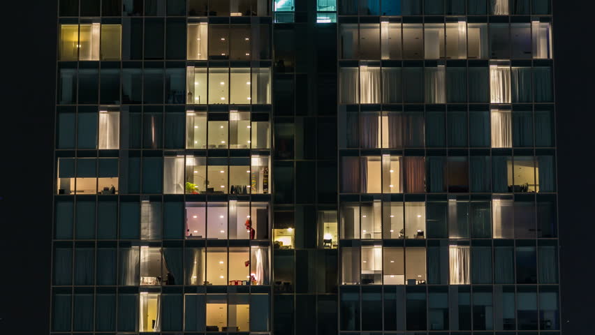 Apartment Building At Night aerial view of apartment buildings at night. urban living Apartment Building At Night aerial view of apartment buildings at night. urban living