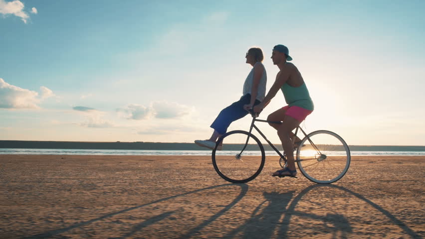 man and woman on bike