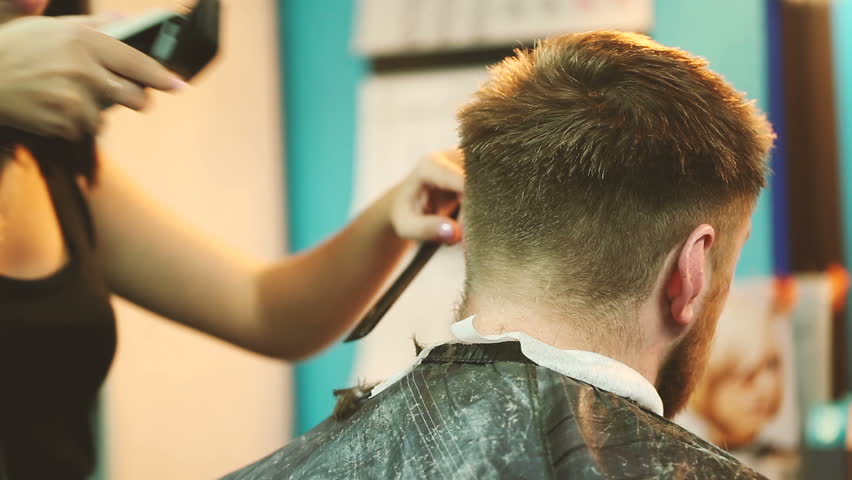 Young Woman Barber Cuts The Stock Footage Video 100 Royalty Free