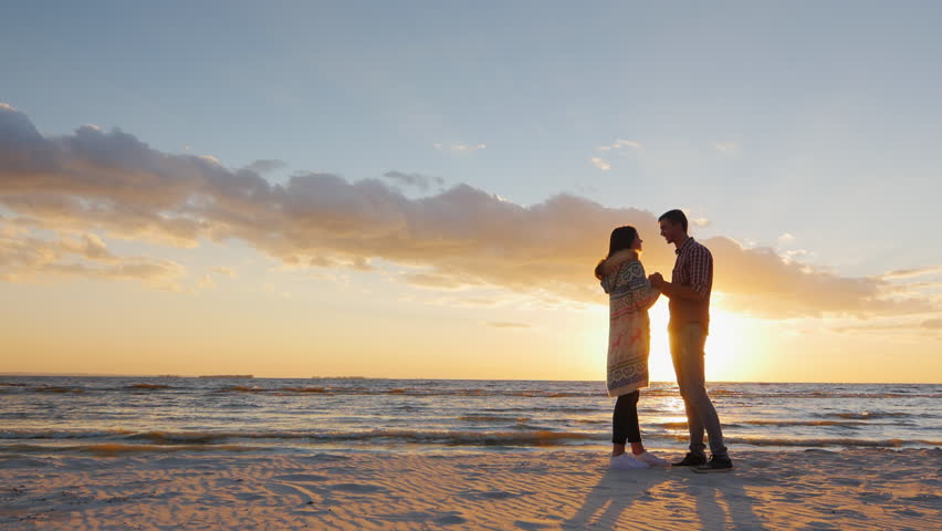 Couple Silhouette At The Beach. Sunset Light. Stock Footage Video ...