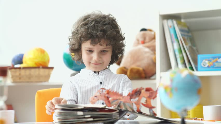 4k00 15child And Book Cute Boy With Black Curly Hair Opens The