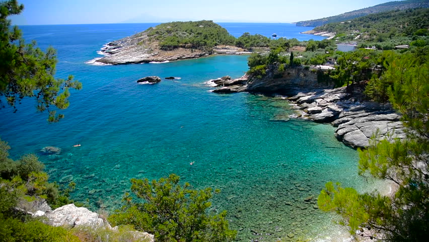 Beautiful Greek Beach With Crystal Clear Water Rocky Shores And