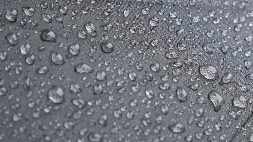 Close-up Waterproof Umbrella Surface With Tiny Rain Droplets Slow ...