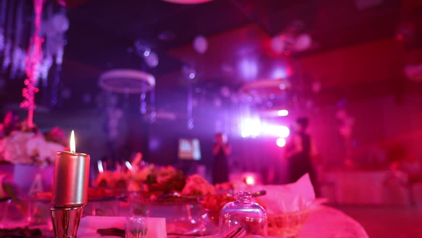 Restaurant Background With People candle on a table with a meal in the restaurant on the background Restaurant Background With People candle on a table with a meal in the restaurant on the background