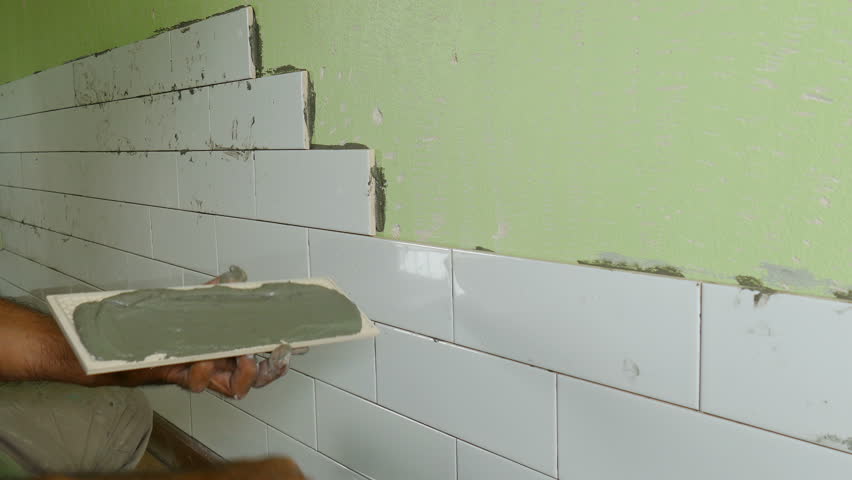 4k00 16man Applying Glue To Ceramic Tile And Putting On Applying Glue To Ceramic Tile