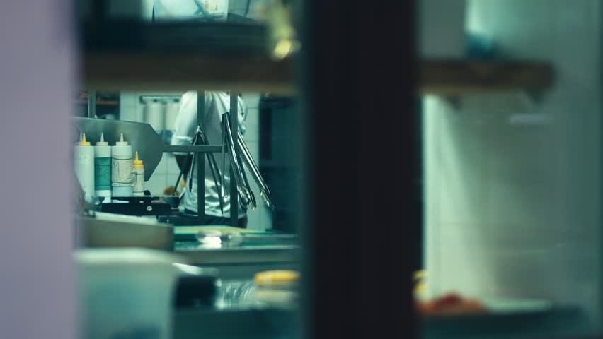 Restaurant Kitchen Video hd cinemagraph. handsome caucasian chef standing in the restaurant Restaurant Kitchen Video hd cinemagraph. handsome caucasian chef standing in the restaurant