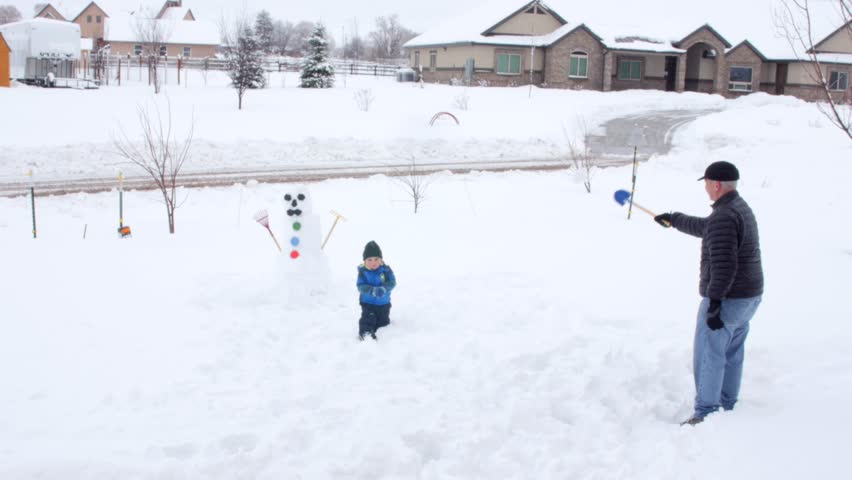 man boy snowfall man boy snowfall
