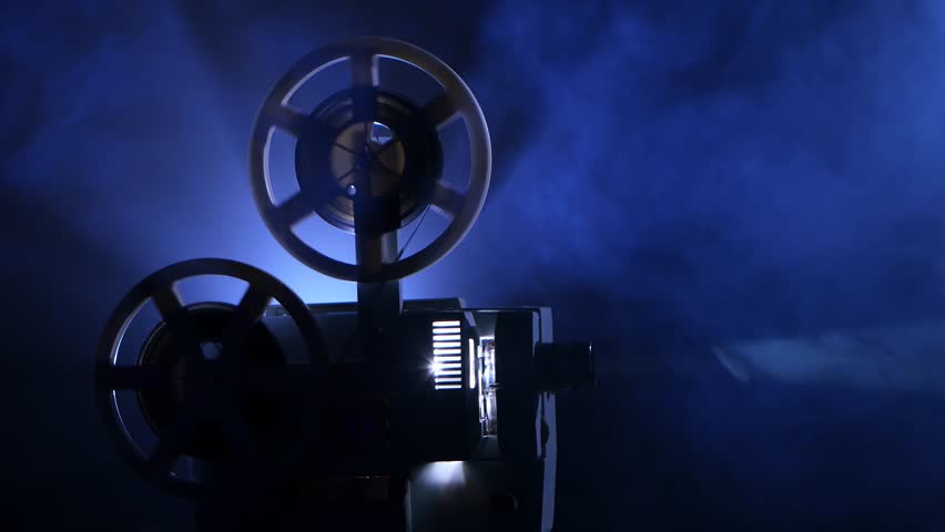 Closeup Of A Vintage Movie Projector. Projection Rays In Move Stock 