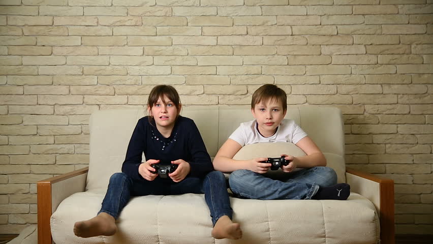 Two Kids Playing Video Games Stock Footage Video 100 Royaltyfree