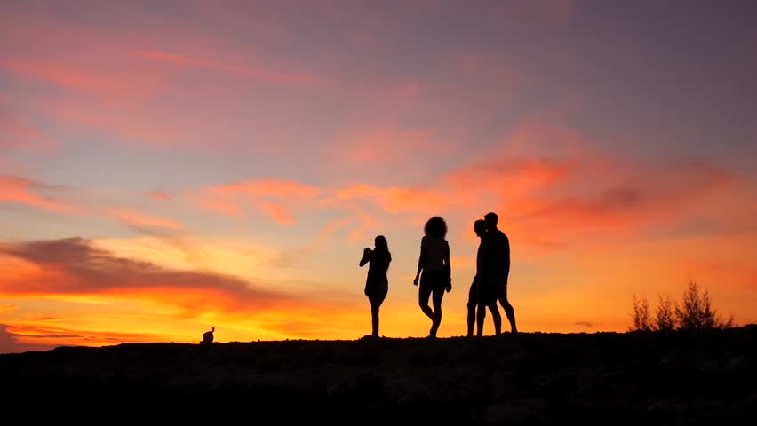 Couple Walks Into Sun Up Hill And Then Stops To Take In Romantic ...