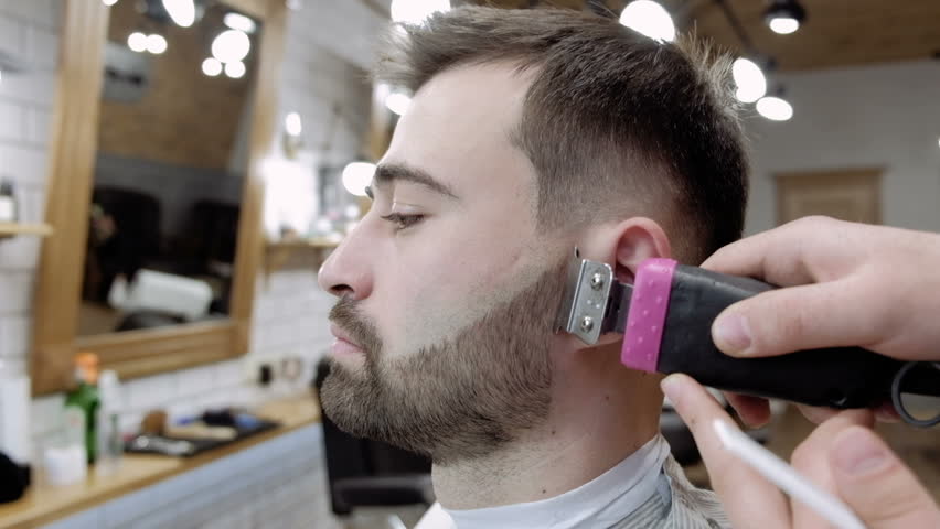 Hd00 09master Cuts Hair And Beard Of Men In The Barbershop