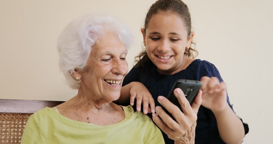 Image result for grandmother and granddaughter with mobile photo