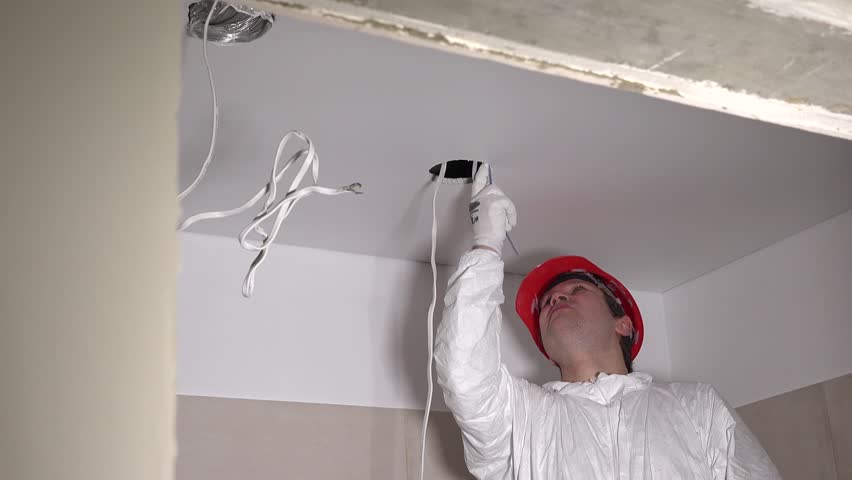 4k00 10designer Man Making Hole In Ceiling Plasterboard For