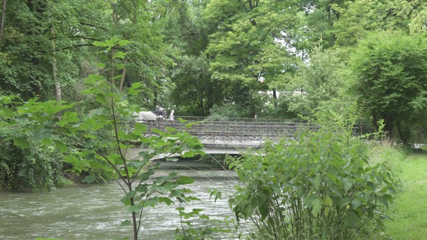 Small Bridge Over Eisbach In Munich Englischer Garten