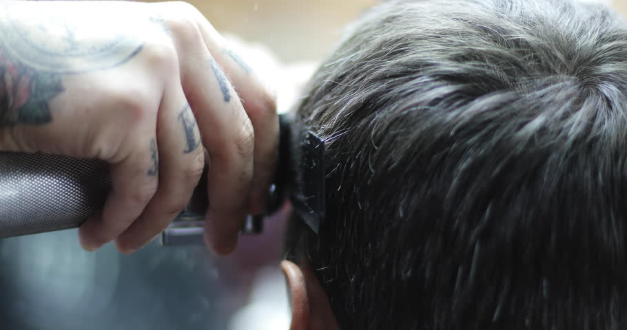 4k00 08close Up Of Tattooed Hands Of A Hairdresser A Stylist Barber