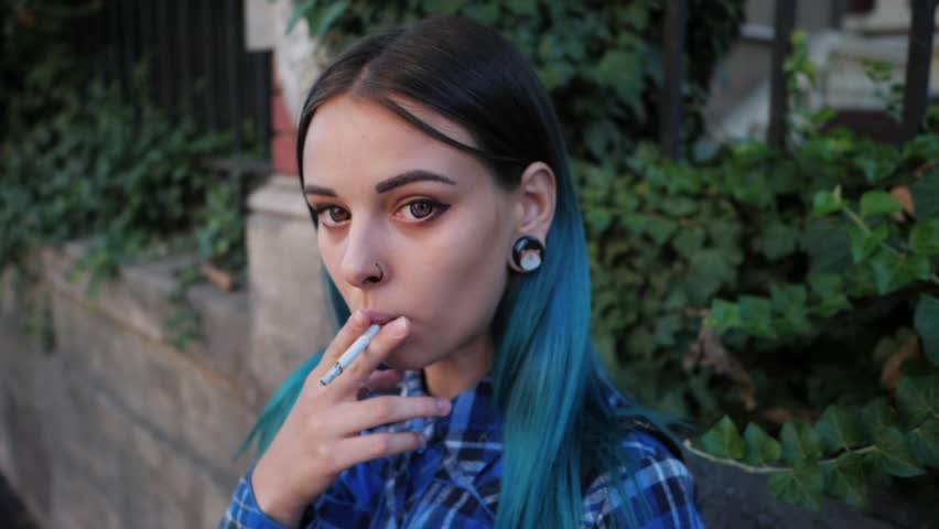 Young Punk Girl Smoking Cigarette By The Wooden Door Hipster With Blue