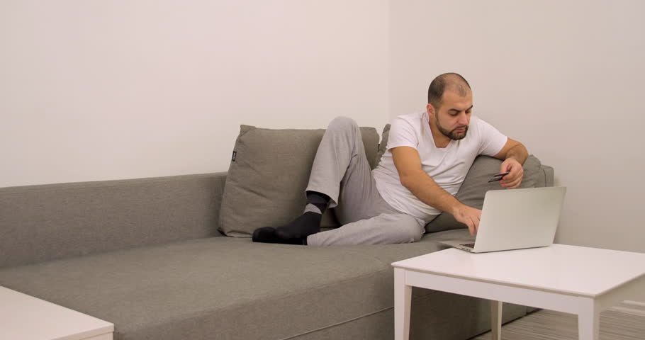 Man At Home Sofa Making Stock Footage Video 100 Royalty Free 30847216 Shutterstock