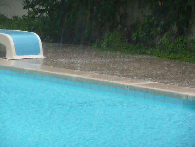 above ground pool overflowing from rain