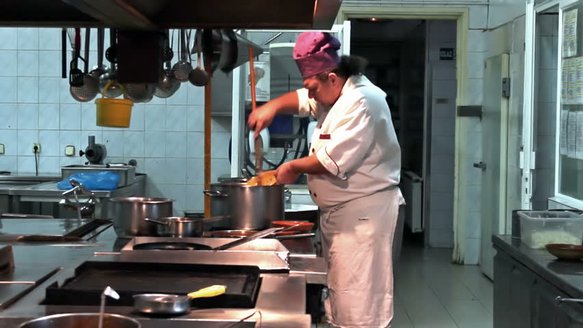 Restaurant Kitchen Video chef preparing food ; chef preparing food in the restaurant Restaurant Kitchen Video chef preparing food ; chef preparing food in the restaurant
