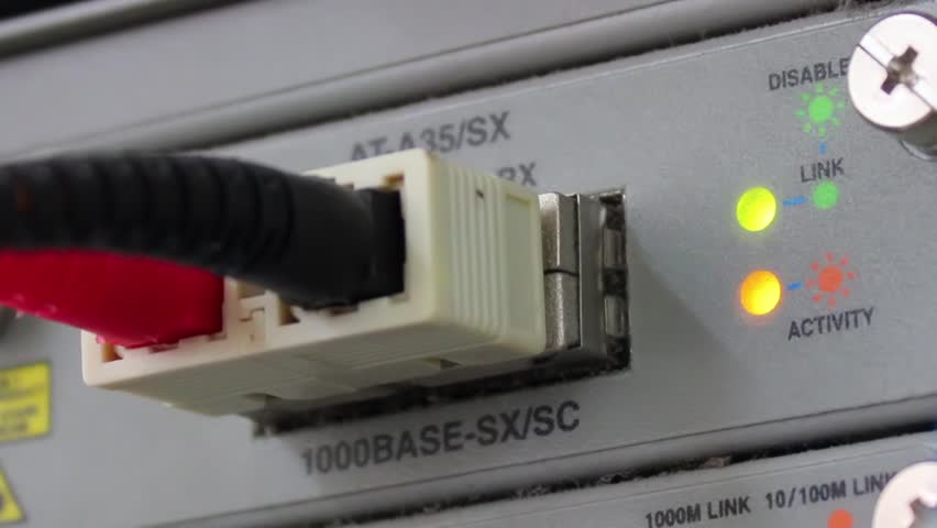 Stock video of fiber cable connector switch, insert a | 4136026 ...