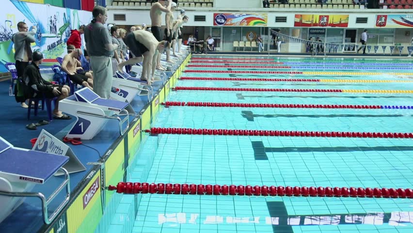 Olympic Swimming Starting Blocks swimming pool and starting blocks, tilt shot stock footage video Olympic Swimming Starting Blocks swimming pool and starting blocks, tilt shot stock footage video