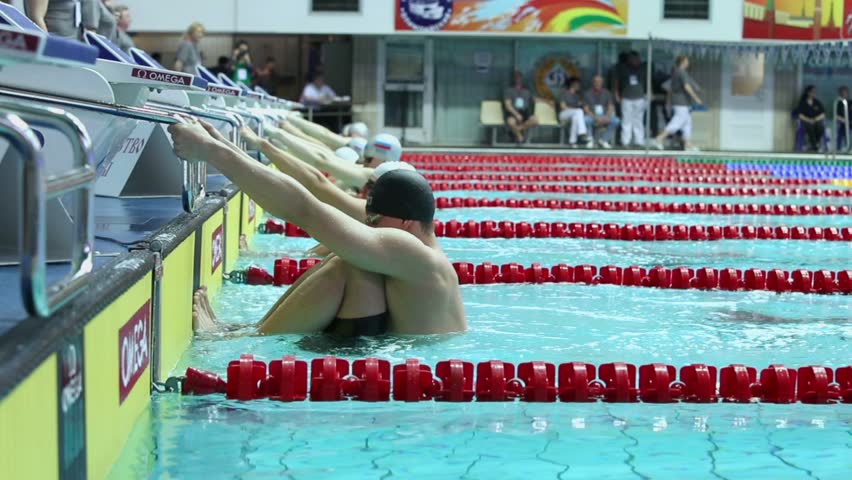 Olympic Swimming Starting Blocks swimming pool and starting blocks, tilt shot stock footage video Olympic Swimming Starting Blocks swimming pool and starting blocks, tilt shot stock footage video