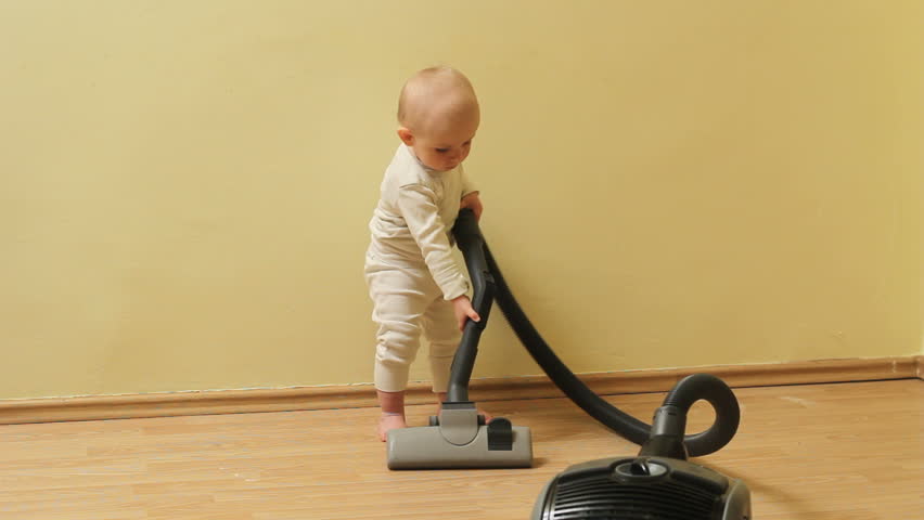 Little Boy Helping With The Dishes But Actually Making A Bigger Mess Of ...