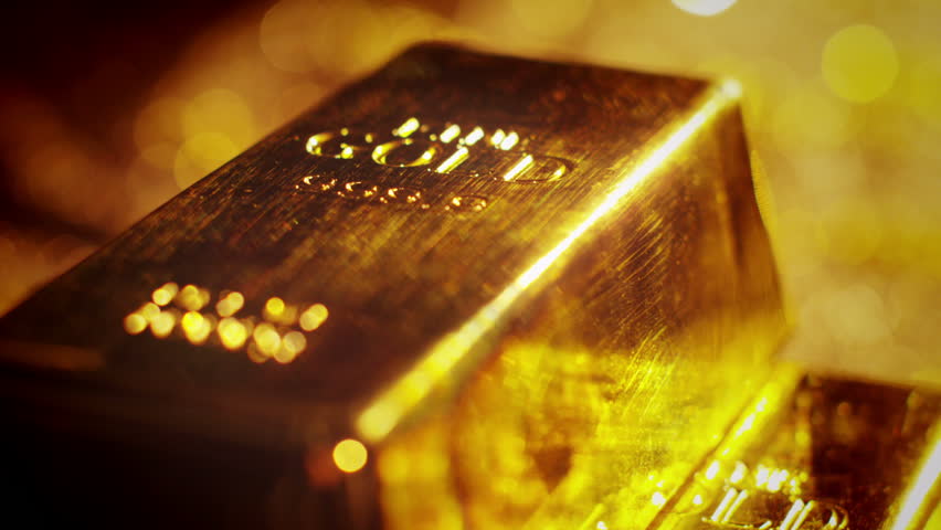 Gold bars, coins and riches. A scene of cluttered treasure and diamonds. Unimaginable wealth.