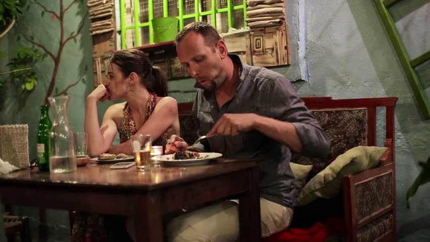 Unhappy, Bored Couple On Bad Date In Restaurant Stock Footage Video