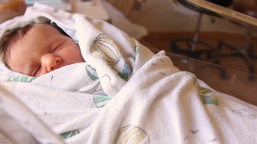 The Camera Floats Over A Stock Footage Video 100 Royalty Free The Camera Floats Over A New Born Baby Sleeping In Hospital Nursery Hours After Being