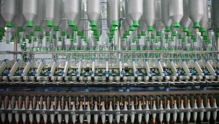 Textile Industry. Row Of Automated Machines For Yarn Manufacturing ...