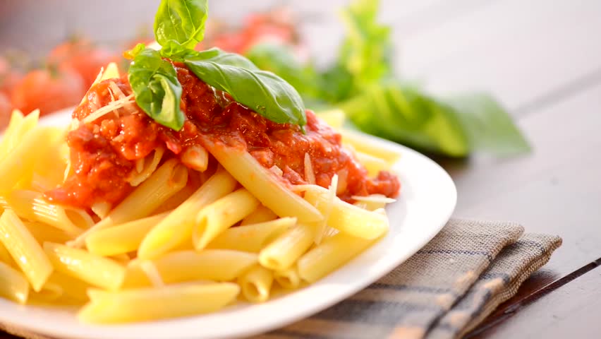 Pasta Penne With Bolognese Sauce, Parmesan Cheese And Basil. Italian ...