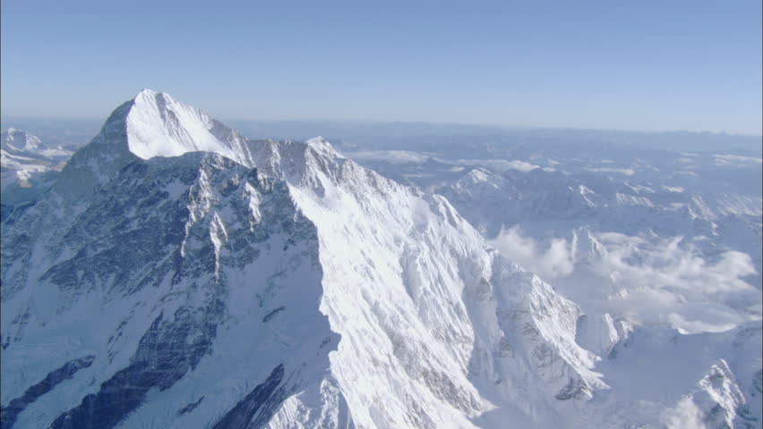 Clouds Snow Polar Rocky Mountains. High Elevation Shot Of Snowy Polar ...