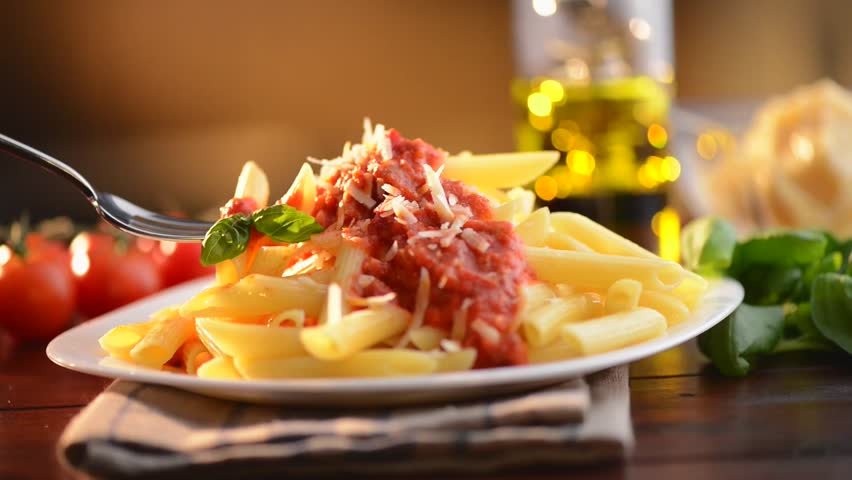 Pasta Penne with Bolognese Sauce, stock-videoer (100 % royaltyfri ...