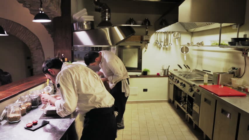 Restaurant Kitchen Video male chefs in hotel or restaurant kitchen working and washing Restaurant Kitchen Video male chefs in hotel or restaurant kitchen working and washing