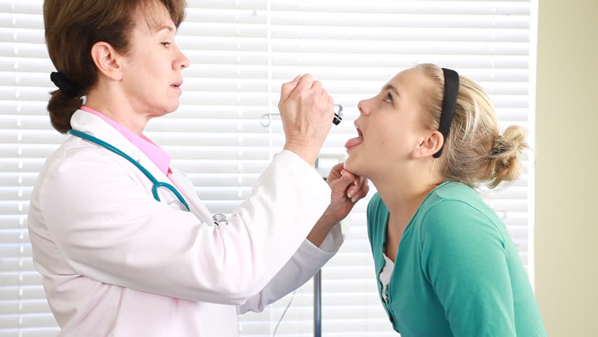 A Physician Examines a Young Stock Footage Video (100% Royalty-free) 573316  | Shutterstock