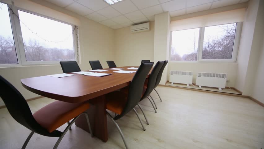 Small Conference Room With A Stock Footage 100 Royalty Small Conference Room With A Wooden Table Black Chairs And View Out The Window At Snow Covered Yard