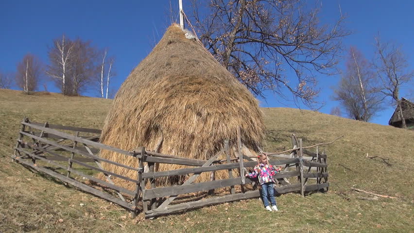 Child Playing By Haystack Little Stock Footage Video 100