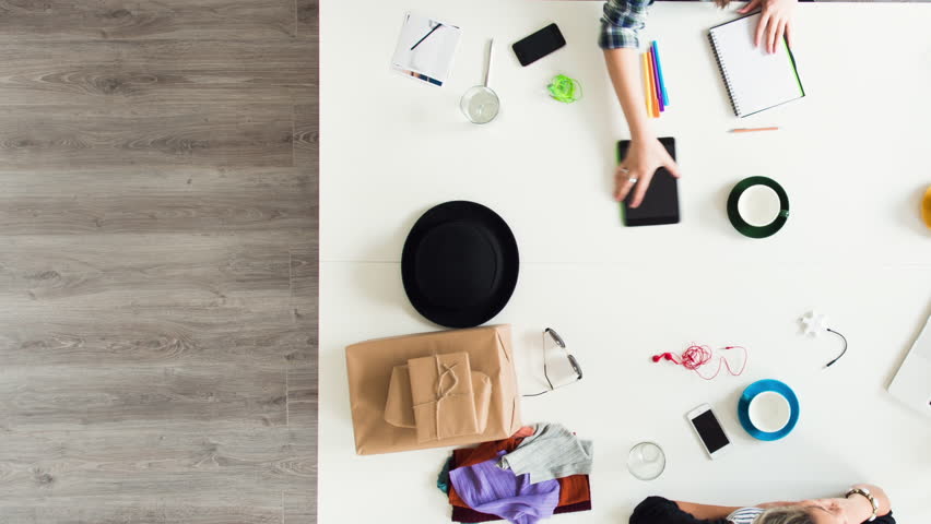 Mixed race group of people aerial view timelapse hipster office small business start up company planning creative meeting