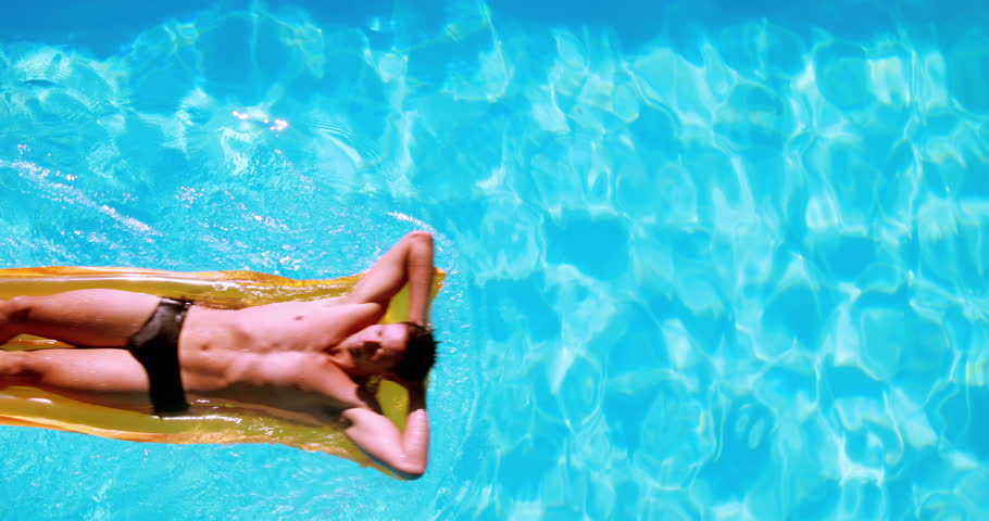 Pool Water With Beach Ball children playing beach ball in swimming pool. stock footage video Pool Water With Beach Ball children playing beach ball in swimming pool. stock footage video