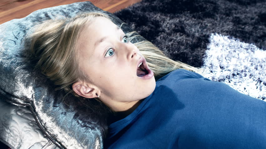 Frightened Girl Watching Scary Horror Stock Footage Video (100% Royalty-free) 7261396 - Shutterstock